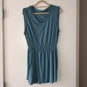 Light blue float dress with cinched waist detail.